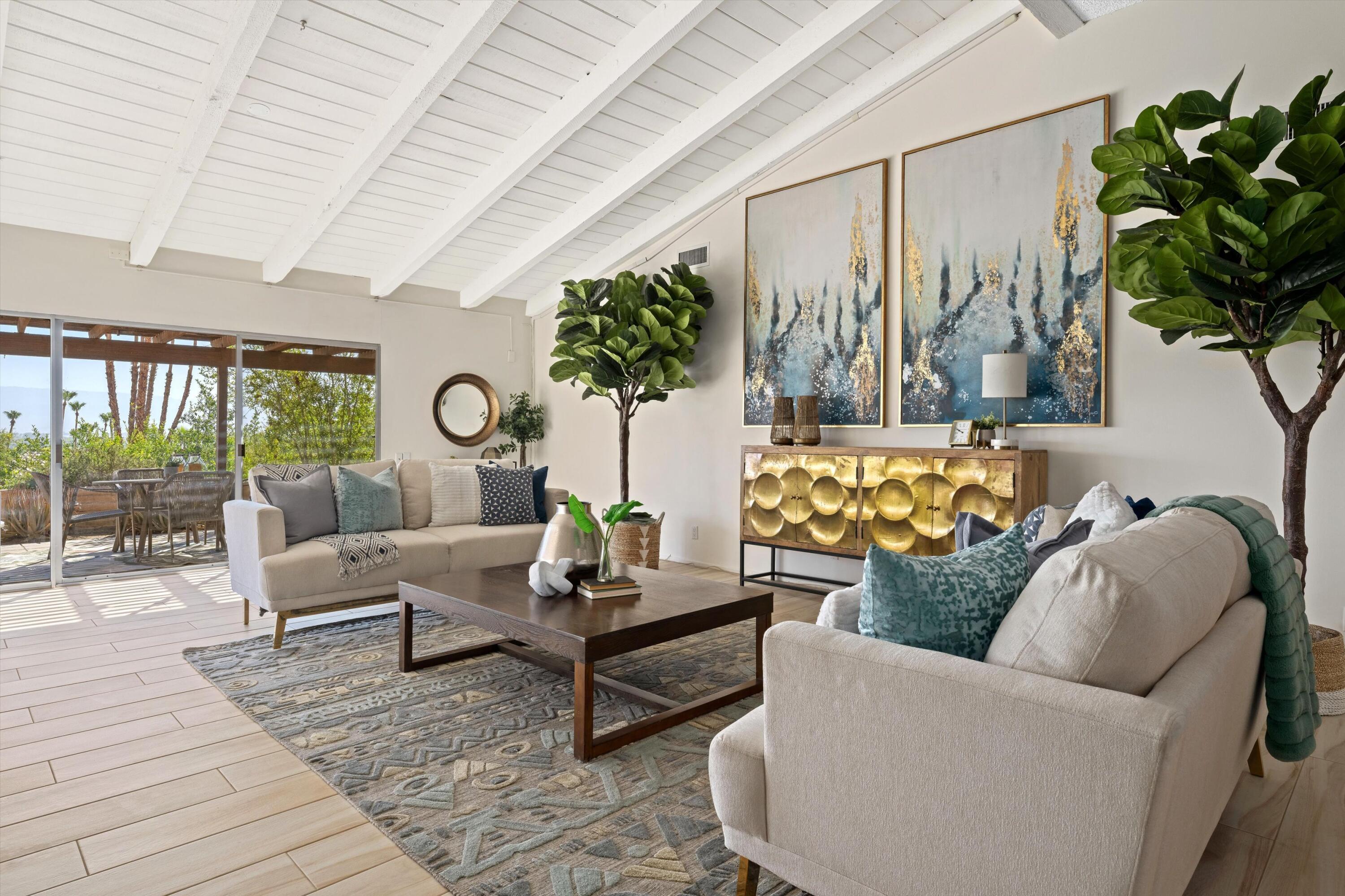40270 Paseo Del Rey Rancho Mirage, CA 92270 - Photo 9 of 41 a living room with furniture and a large window