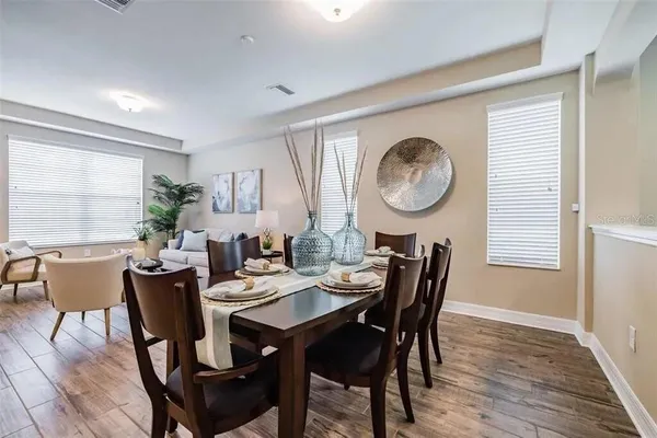 a view of a big room with closet and windows