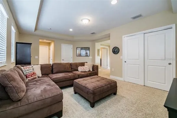 a bedroom with a bed and a cabinets