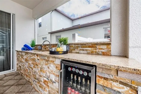 a view of a swimming pool with a patio