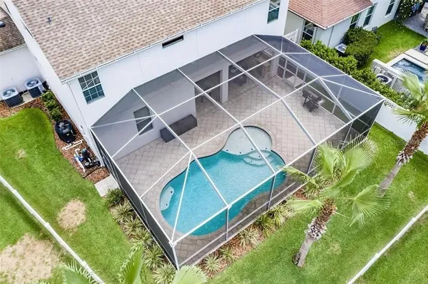 a kitchen with a refrigerator stove and microwave