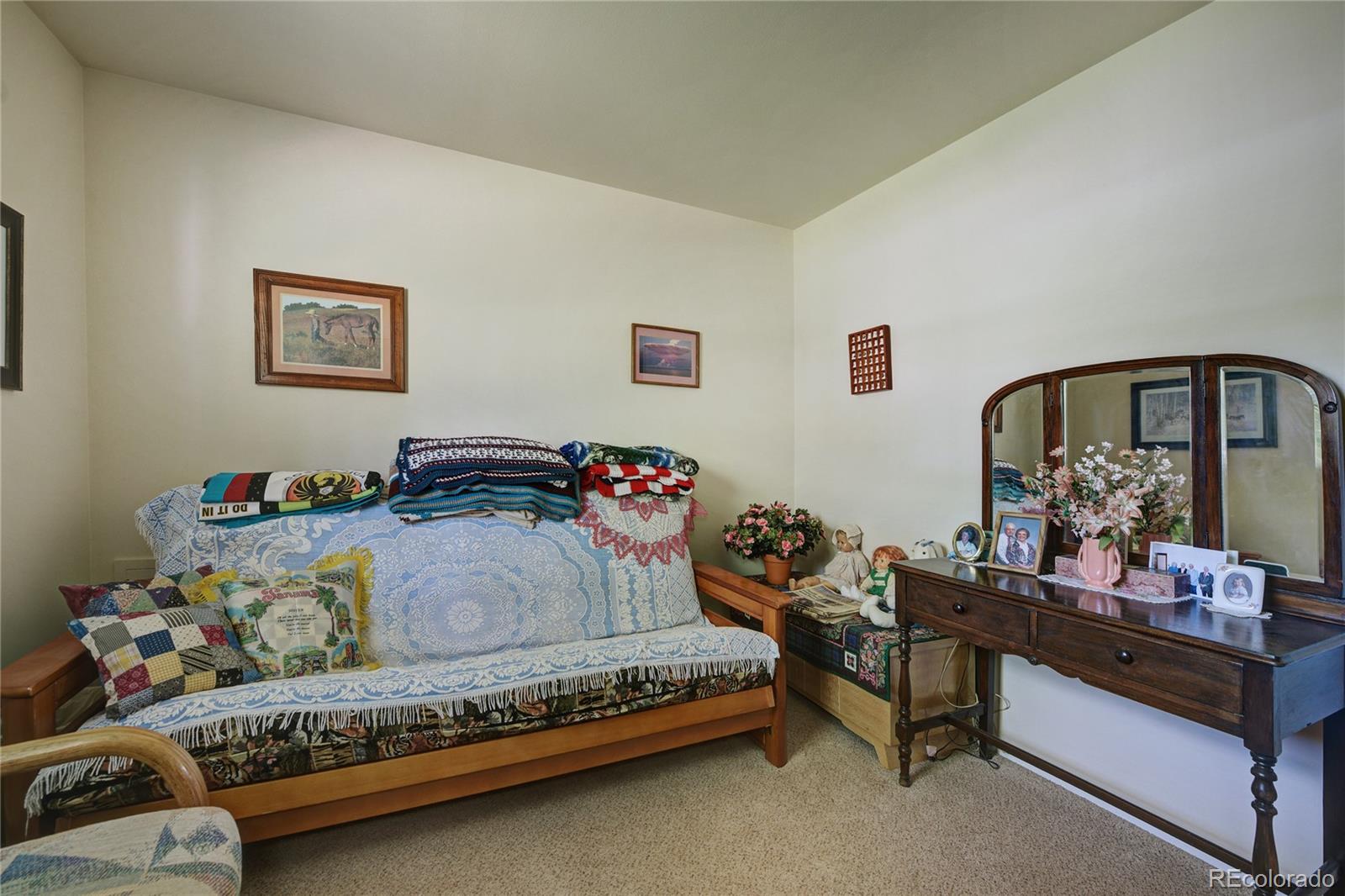 4405 Agate Road Boulder, CO 80304 - Photo 14 of 40 a bedroom with furniture and a dresser