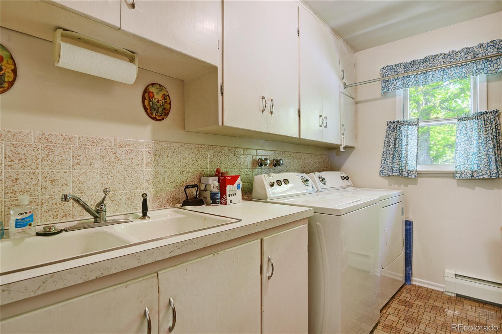4405 Agate Road Boulder, CO 80304 - Photo 24 of 40 a view of storage and utility room with a window