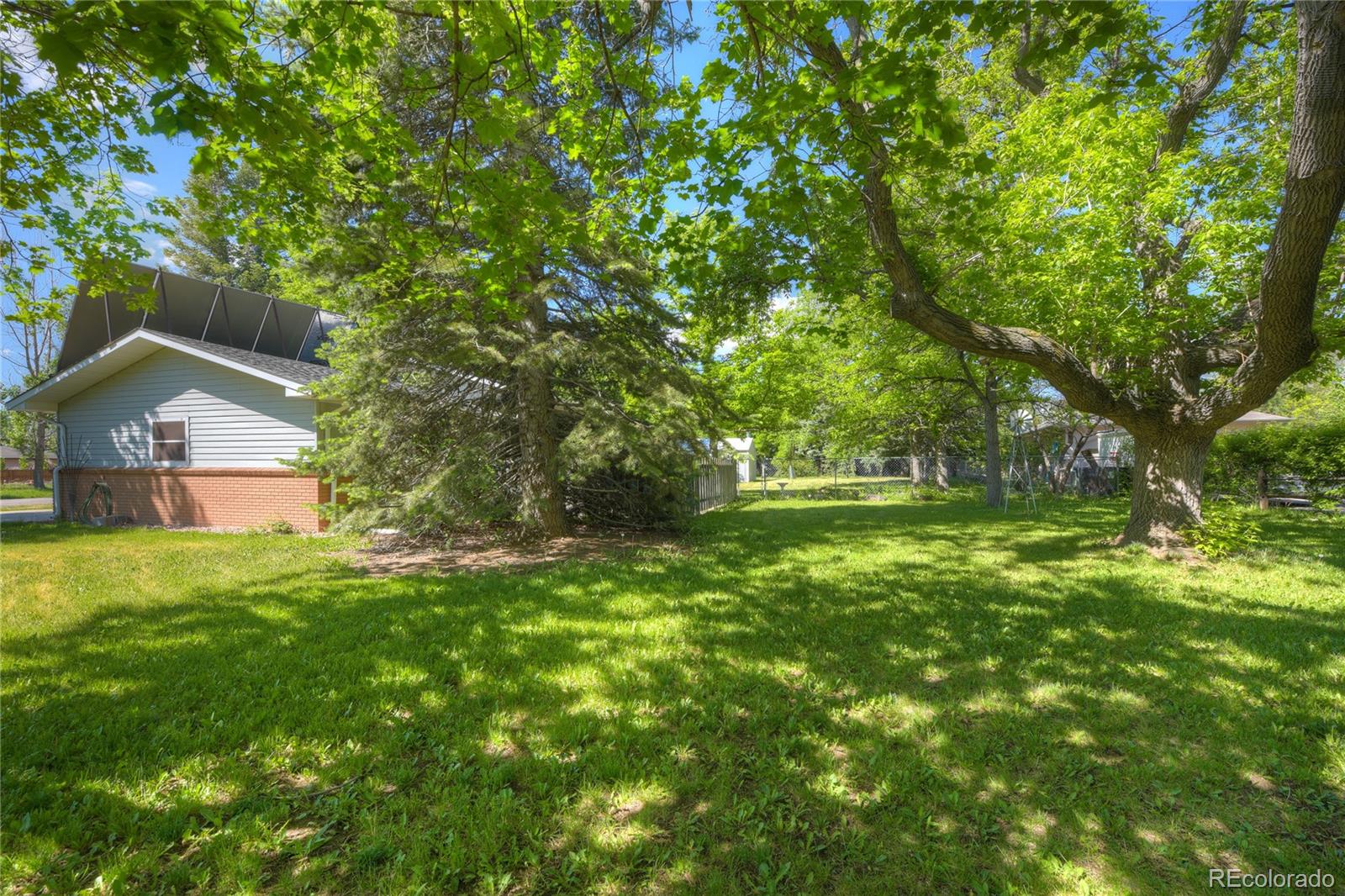 4405 Agate Road Boulder, CO 80304 - Photo 26 of 40 a house view with a garden space