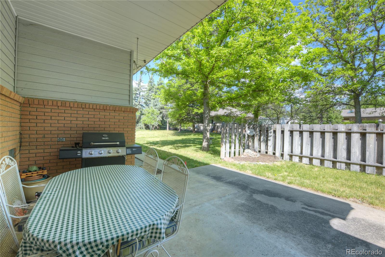 4405 Agate Road Boulder, CO 80304 - Photo 32 of 40 a view of a backyard with a garden