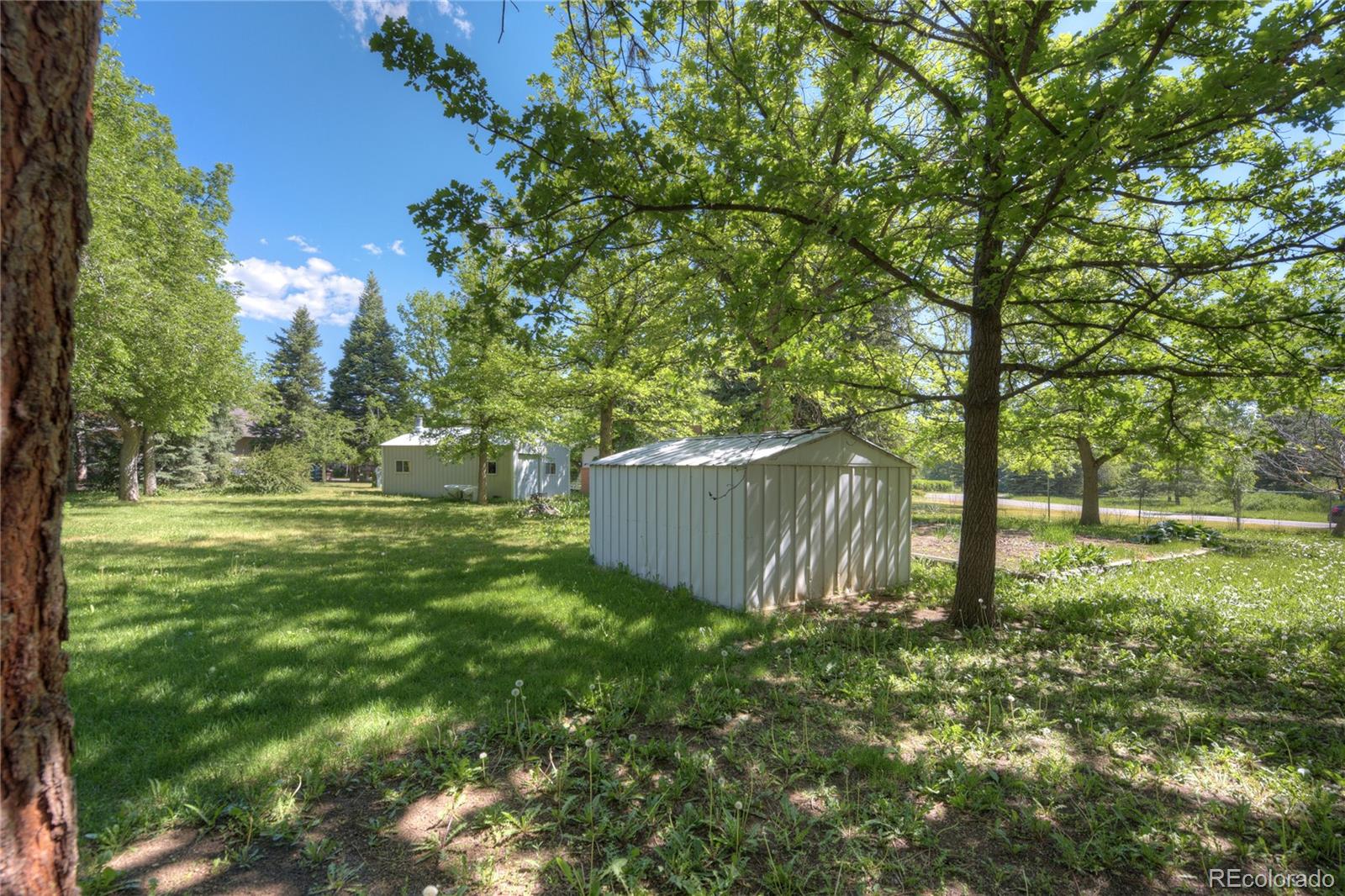 4405 Agate Road Boulder, CO 80304 - Photo 37 of 40 a view of a house with a yard