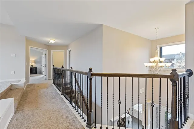 a view of a hallway with a livingroom