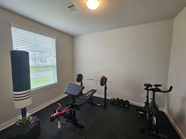 a room with furniture and a window