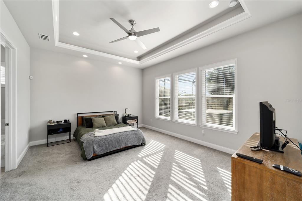 11895 Southwest 33 Lane Gainesville, FL 32608 - Photo 33 of 67 a living room with furniture and a flat screen tv