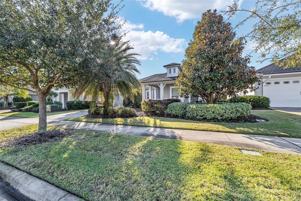 11895 Southwest 33 Lane Gainesville, FL 32608 - Photo 4 of 67 a view of a house with swimming pool and a yard