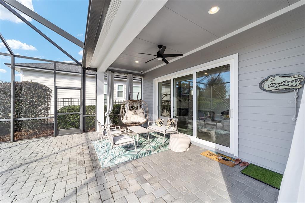 11895 Southwest 33 Lane Gainesville, FL 32608 - Photo 46 of 67 a building outdoor space with patio furniture and garden