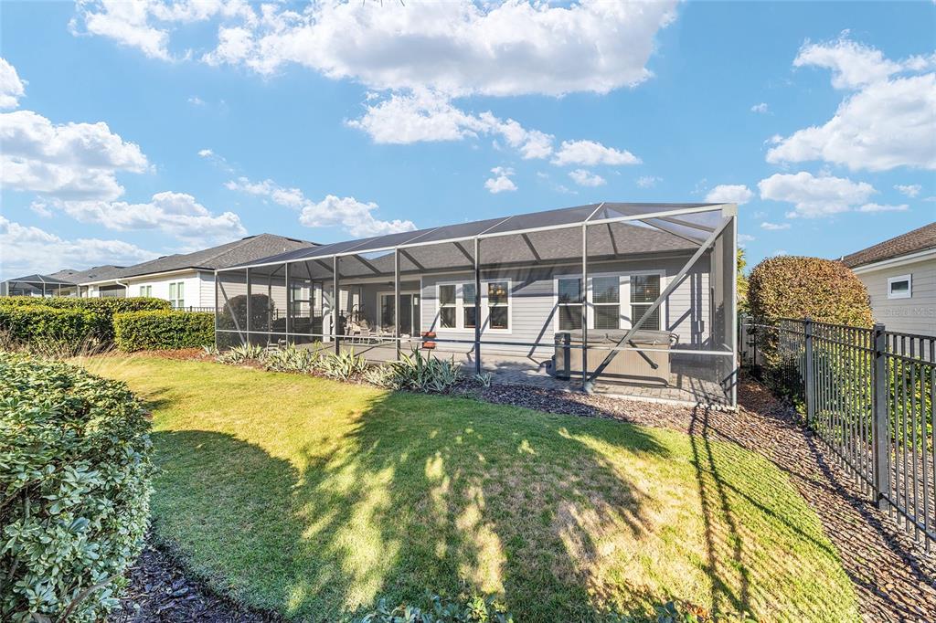 11895 Southwest 33 Lane Gainesville, FL 32608 - Photo 53 of 67 a view of a swimming pool with a patio