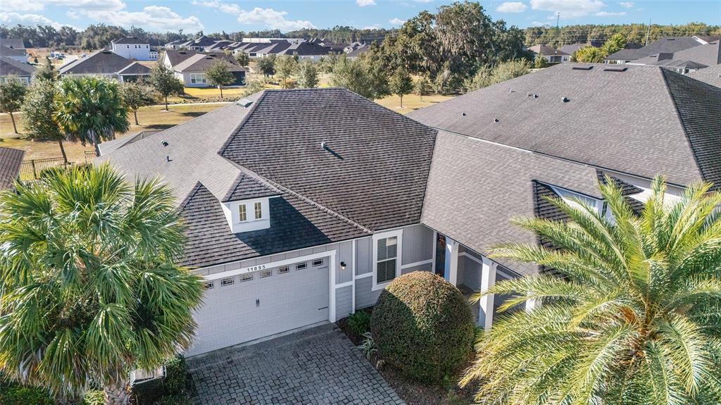 11895 Southwest 33 Lane Gainesville, FL 32608 - Photo 55 of 67 an aerial view of a house with a yard and plants