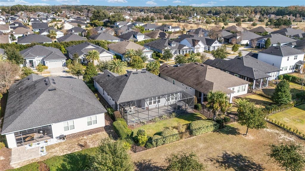 11895 Southwest 33 Lane Gainesville, FL 32608 - Photo 61 of 67 an aerial view of residential houses with outdoor space