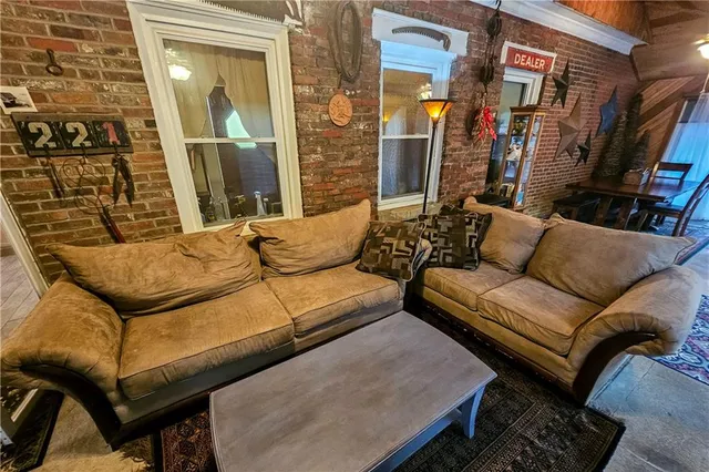 a living room with furniture and a couch