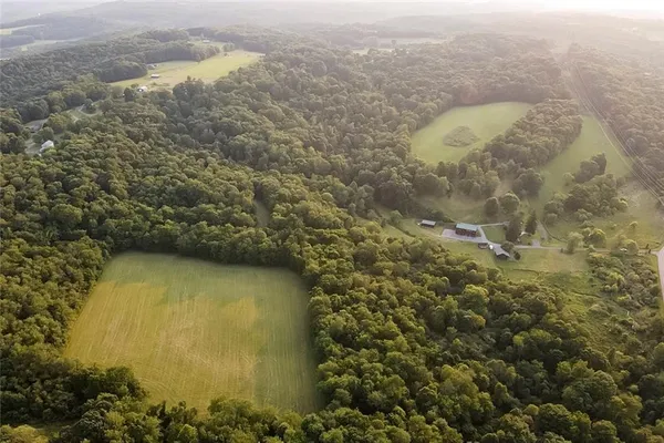 a view of a lake with a yard