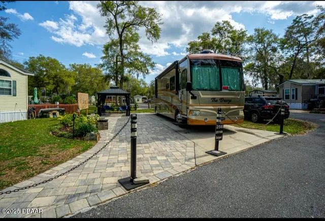 a house view with a garden space