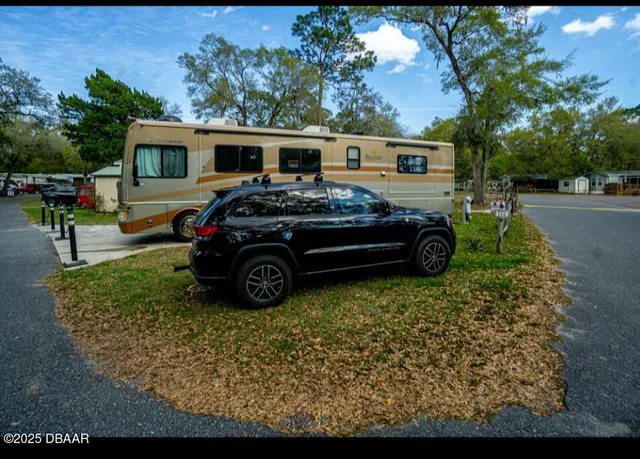 a car parked in front of a house