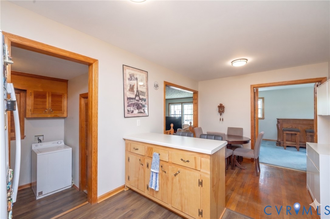 712 Keswick Road Colonial Heights, VA 23834 - Photo 11 of 34 a view of a kitchen counter space and wooden floor