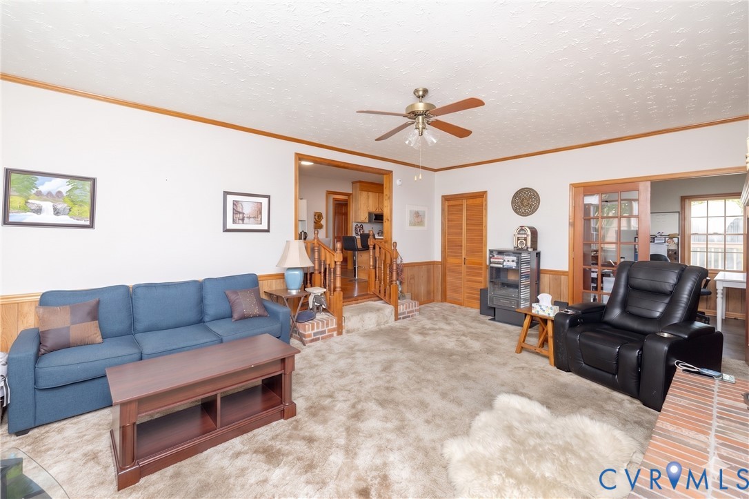 712 Keswick Road Colonial Heights, VA 23834 - Photo 16 of 34 a living room with furniture and a flat screen tv
