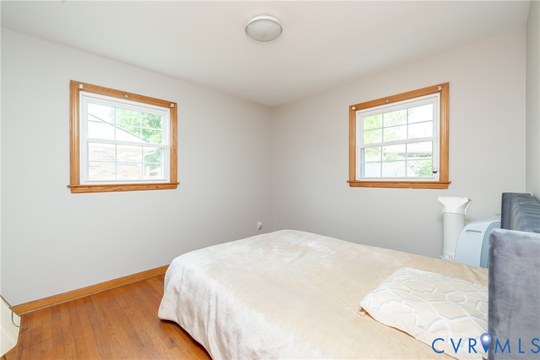 712 Keswick Road Colonial Heights, VA 23834 - Photo 20 of 34 a bedroom with a bed and a window