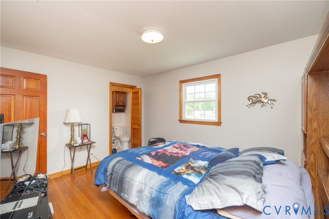 712 Keswick Road Colonial Heights, VA 23834 - Photo 25 of 34 a bedroom with bed and a window