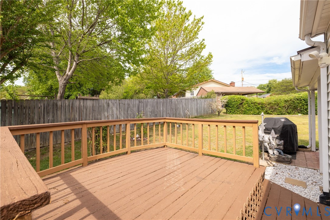 712 Keswick Road Colonial Heights, VA 23834 - Photo 30 of 34 a balcony with wooden floor and fence