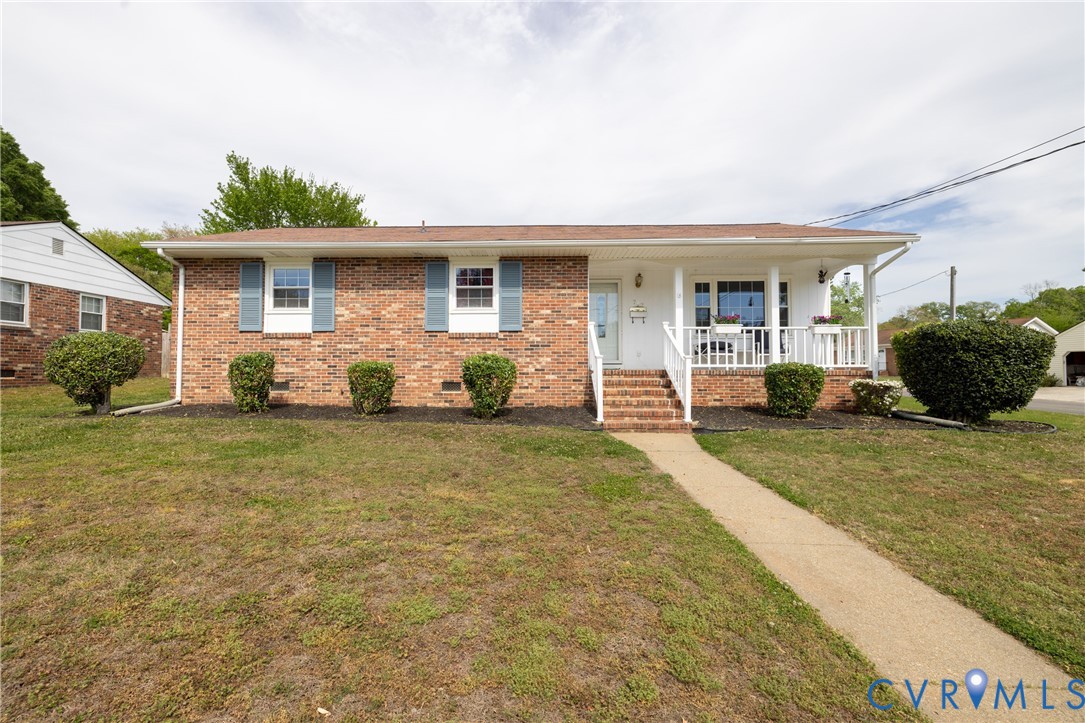 712 Keswick Road Colonial Heights, VA 23834 - Photo 3 of 34 a front view of a house with a patio