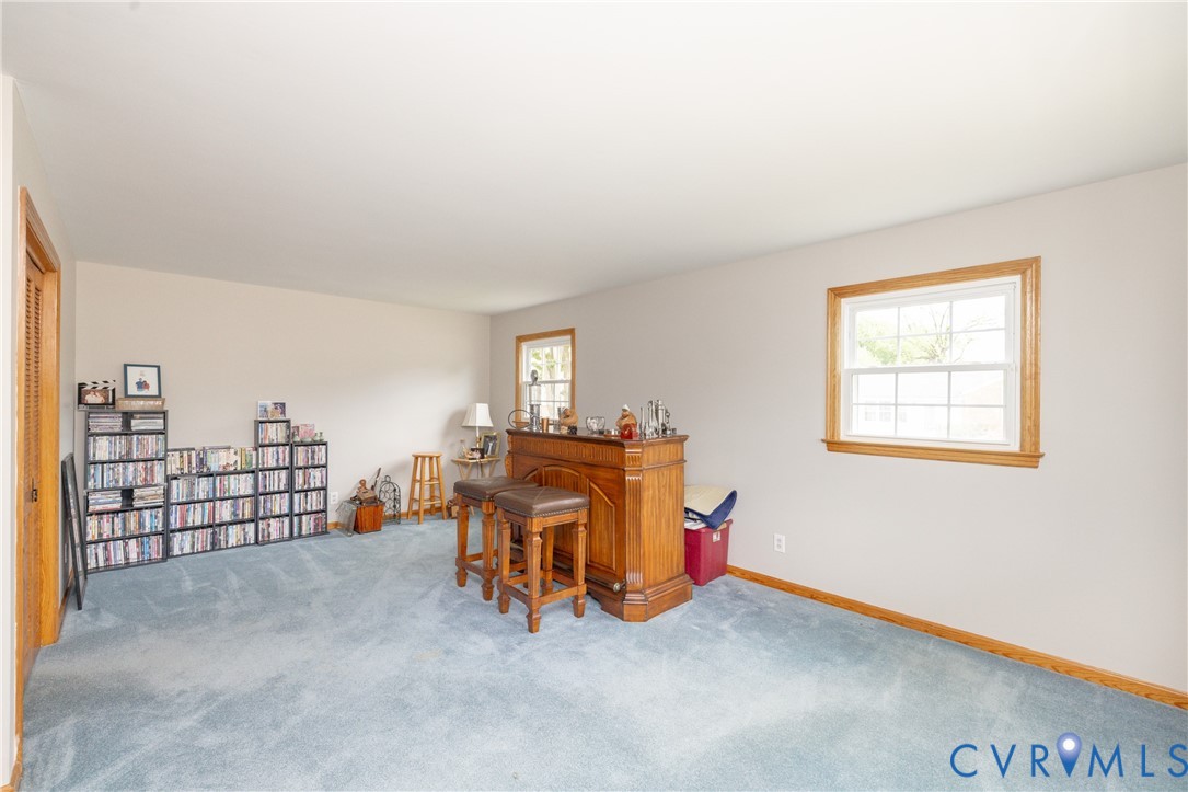 712 Keswick Road Colonial Heights, VA 23834 - Photo 7 of 34 a view of livingroom with furniture and chandelier