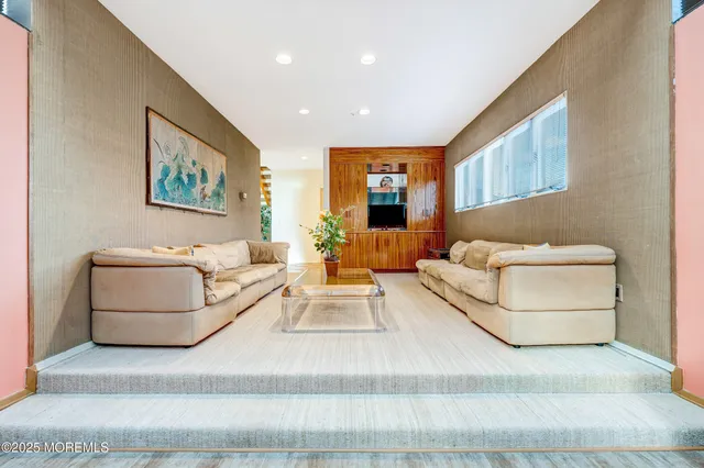 a living room with furniture and a couch