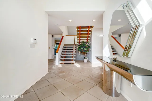 a view of an entryway with stairs