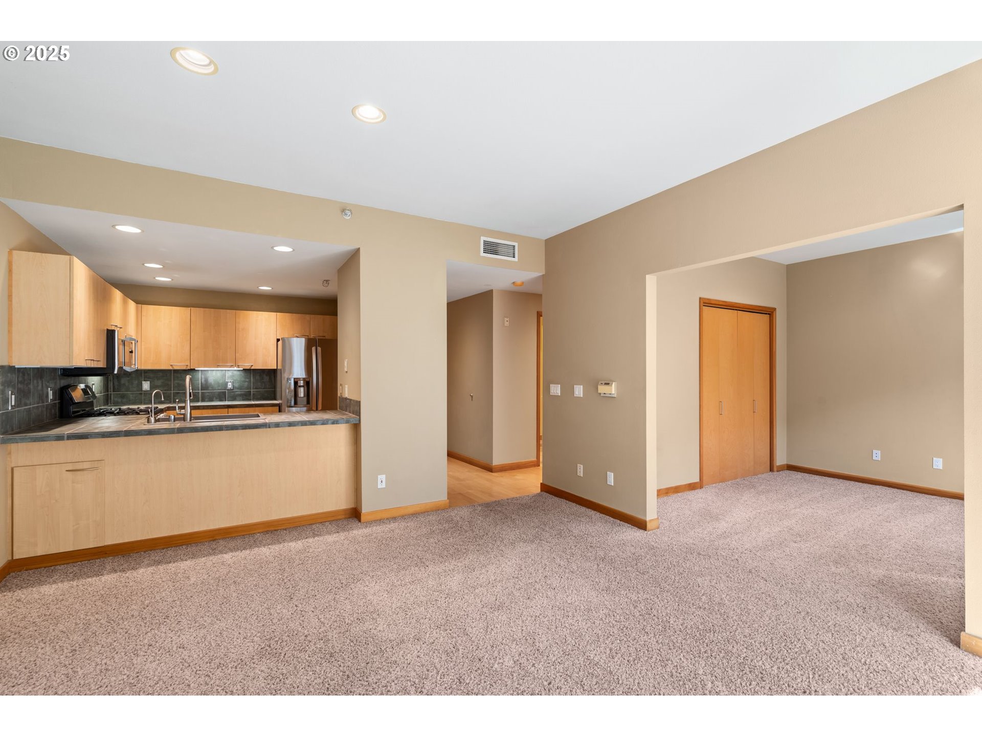 400 West 8th Street, Unit 236 Vancouver, WA 98660 - Photo 12 of 35 a view of a big room with wooden floor and windows