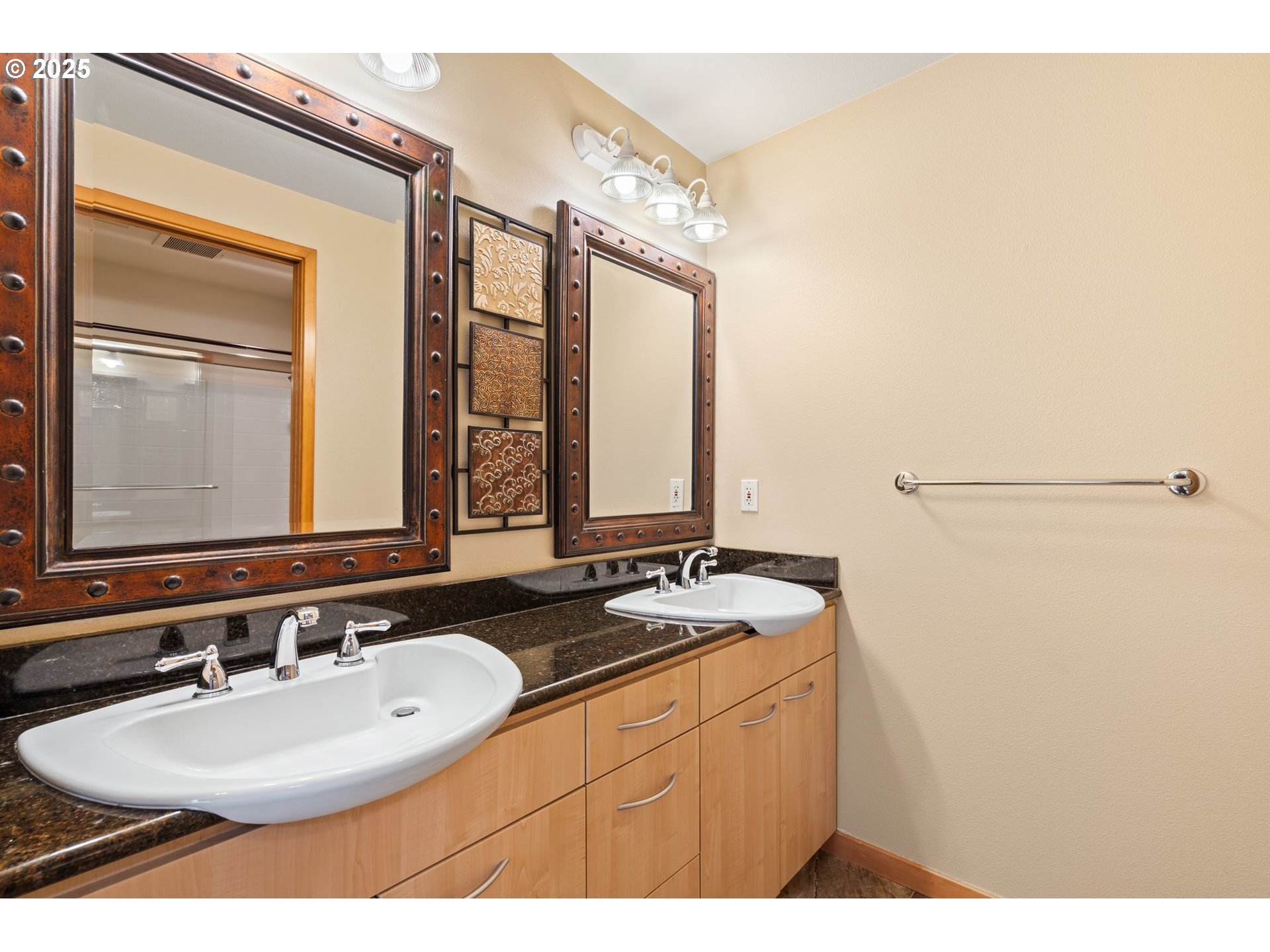 400 West 8th Street, Unit 236 Vancouver, WA 98660 - Photo 24 of 35 a bathroom with a sink and a mirror