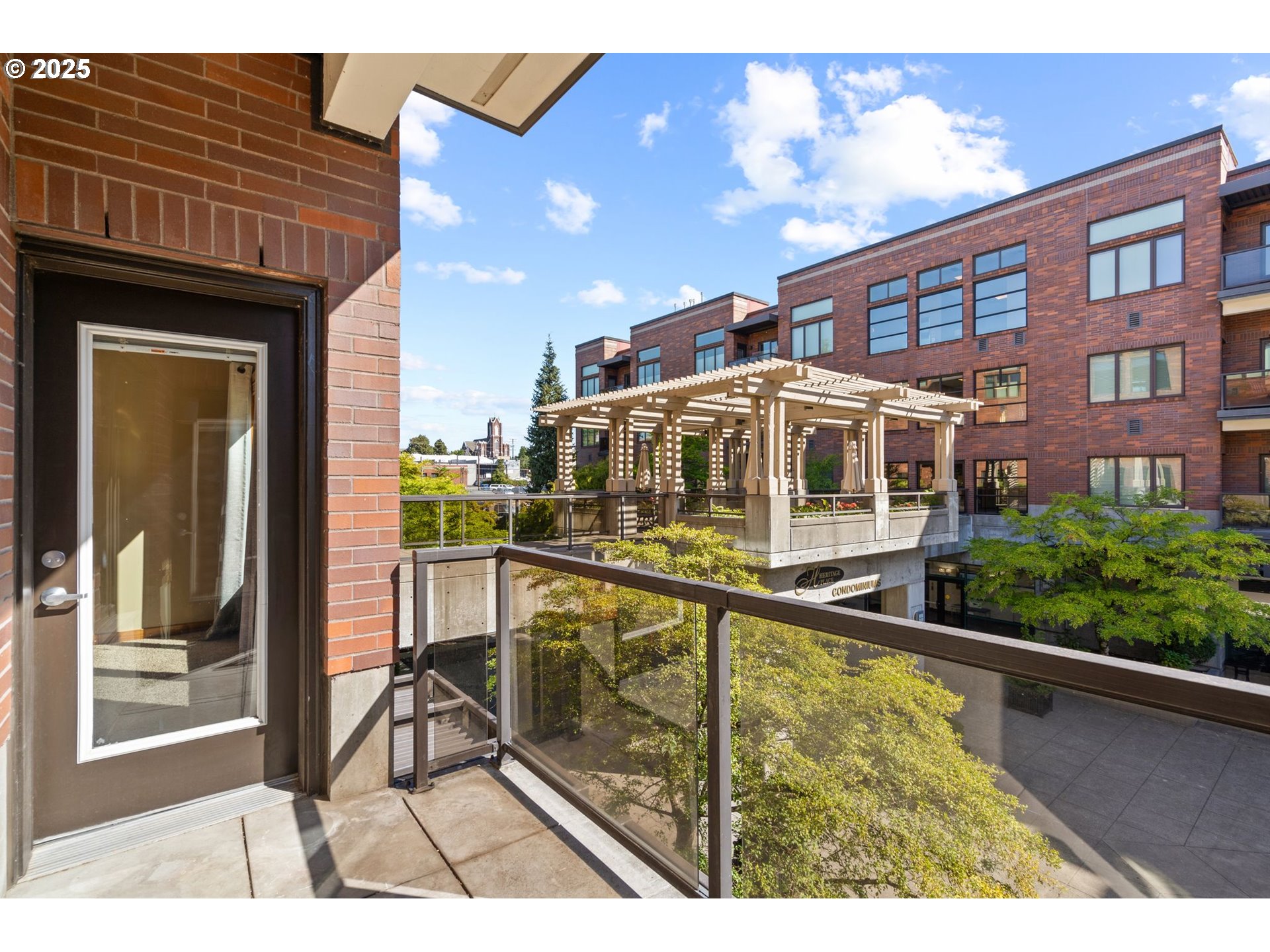 400 West 8th Street, Unit 236 Vancouver, WA 98660 - Photo 28 of 35 a picture of a building from a balcony