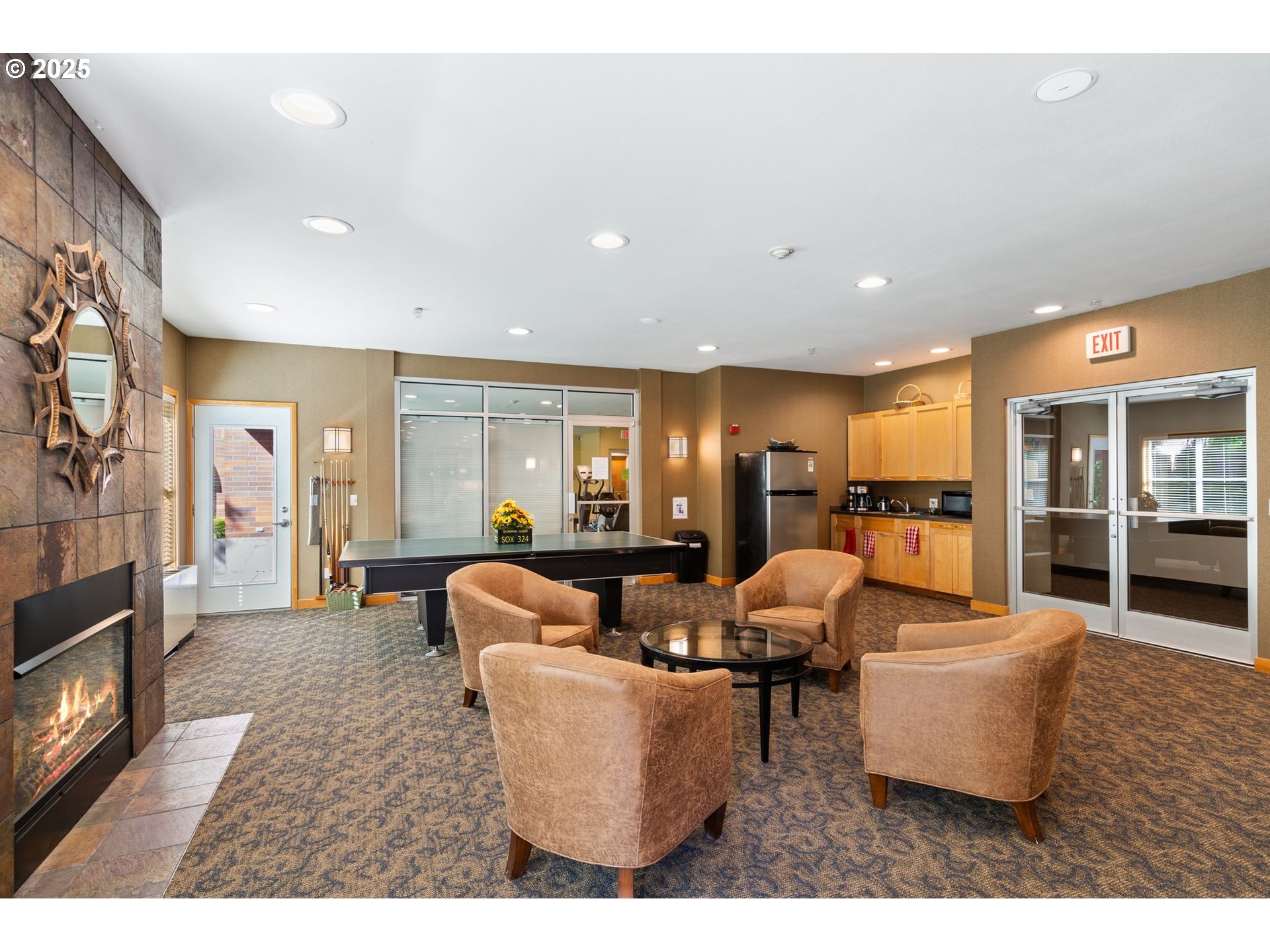 400 West 8th Street, Unit 236 Vancouver, WA 98660 - Photo 34 of 35 a living room with fireplace furniture and flat screen tv