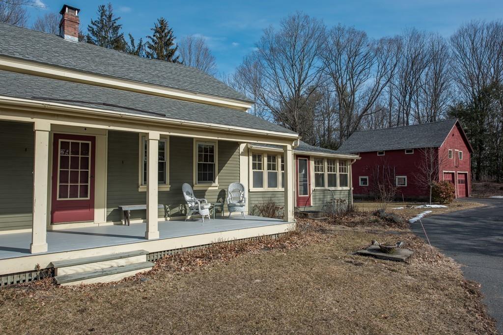 178 West Farms Road Northampton, MA 01062 - Photo 1 of 42 a front view of a house with a patio