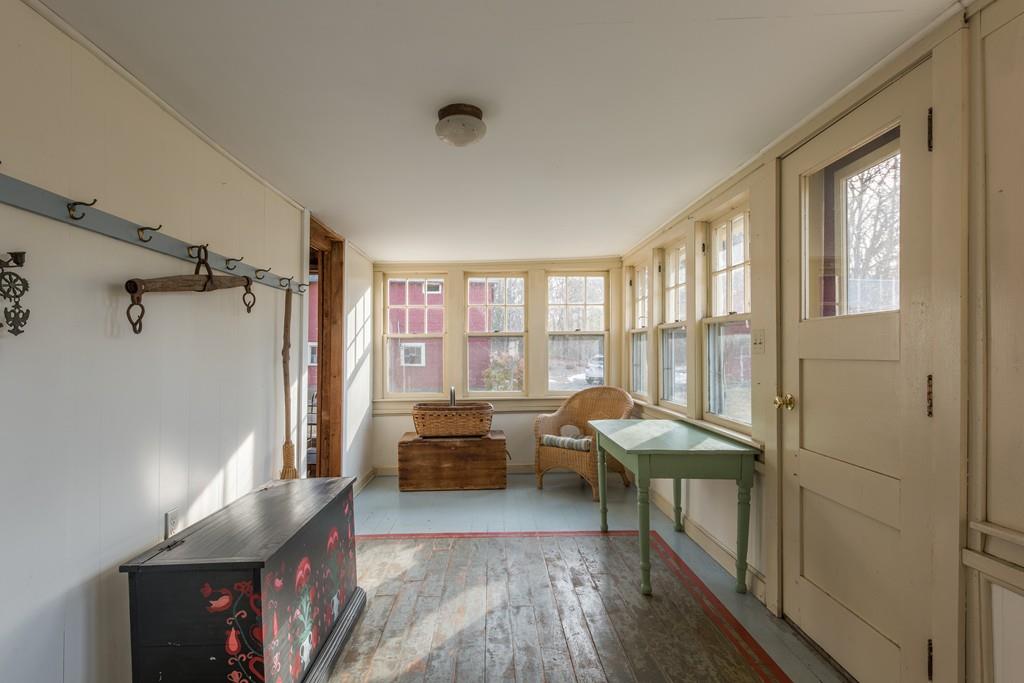 178 West Farms Road Northampton, MA 01062 - Photo 12 of 42 a living room with furniture and a floor to ceiling window