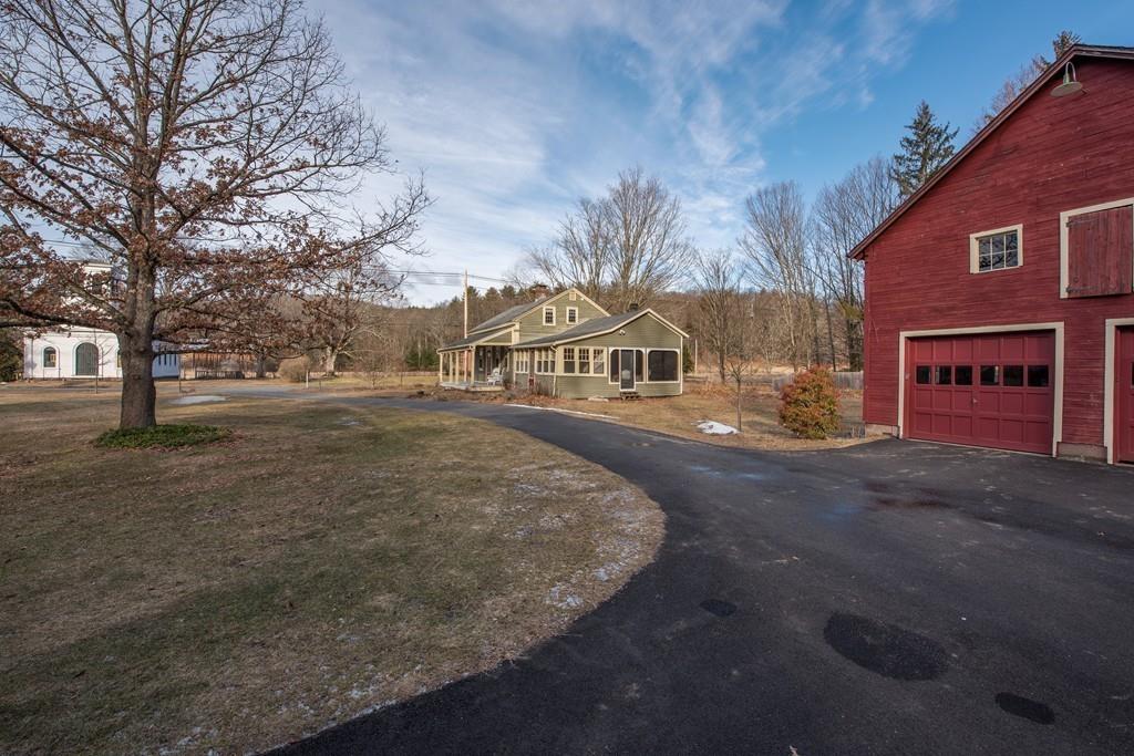 178 West Farms Road Northampton, MA 01062 - Photo 2 of 42 a front view of a house with a yard