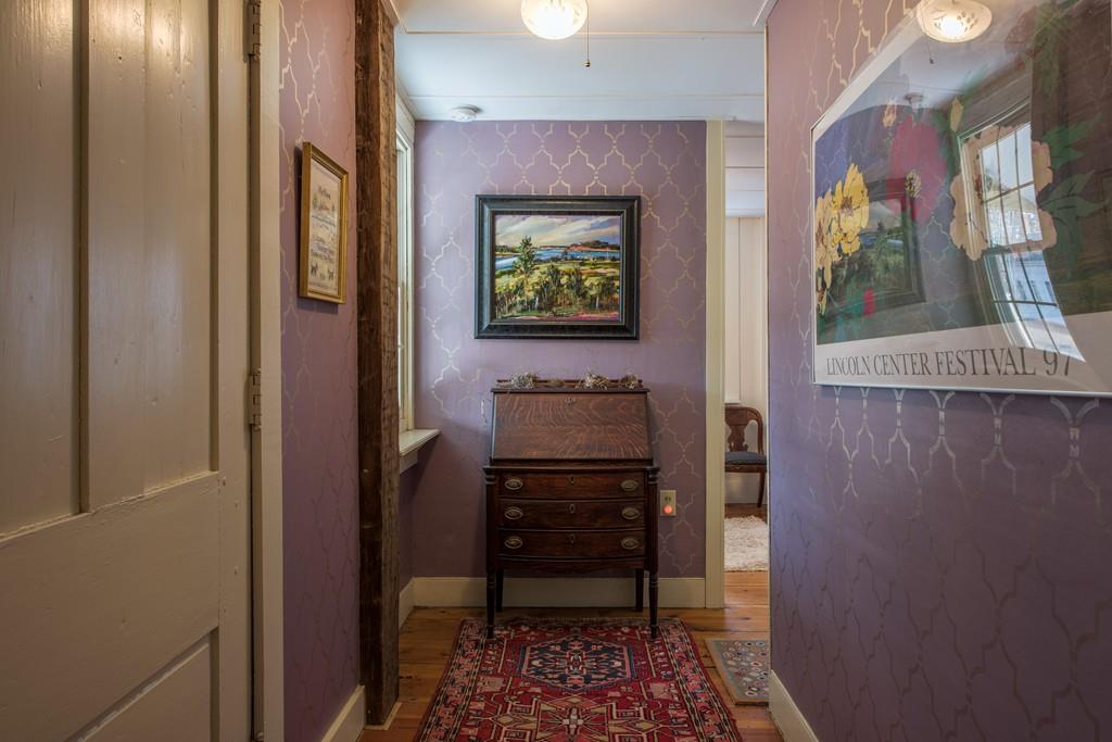178 West Farms Road Northampton, MA 01062 - Photo 22 of 42 a view of a hallway with workspace and a window