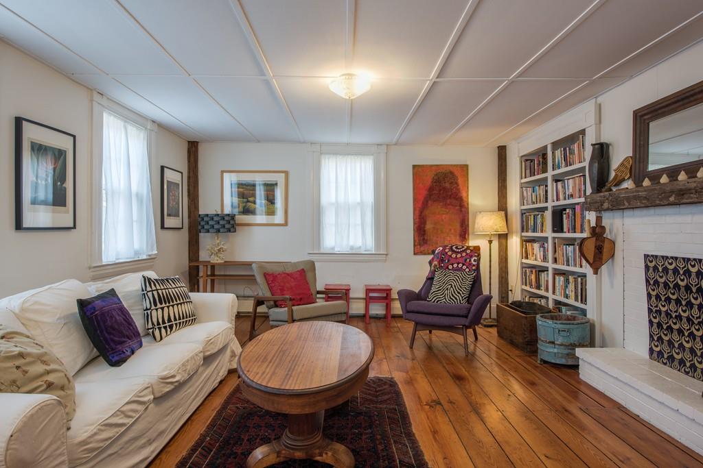 178 West Farms Road Northampton, MA 01062 - Photo 23 of 42 a living room with furniture a rug and a bookshelf