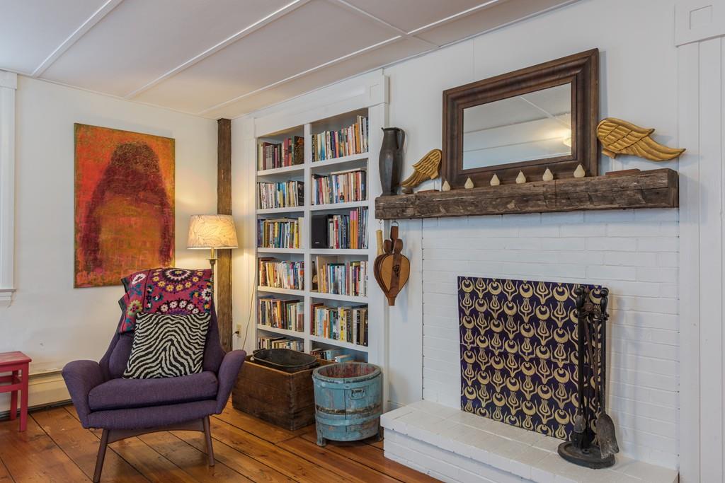 178 West Farms Road Northampton, MA 01062 - Photo 24 of 42 a living room with furniture and a book shelf