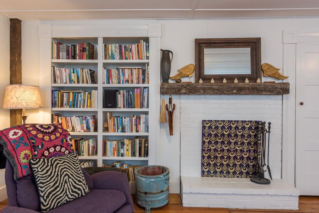178 West Farms Road Northampton, MA 01062 - Photo 26 of 42 a living room with a couch and a book shelf