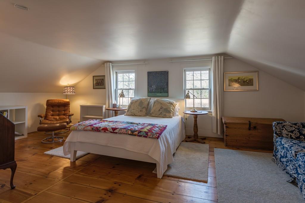 178 West Farms Road Northampton, MA 01062 - Photo 28 of 42 a bedroom with a bed and wooden floor