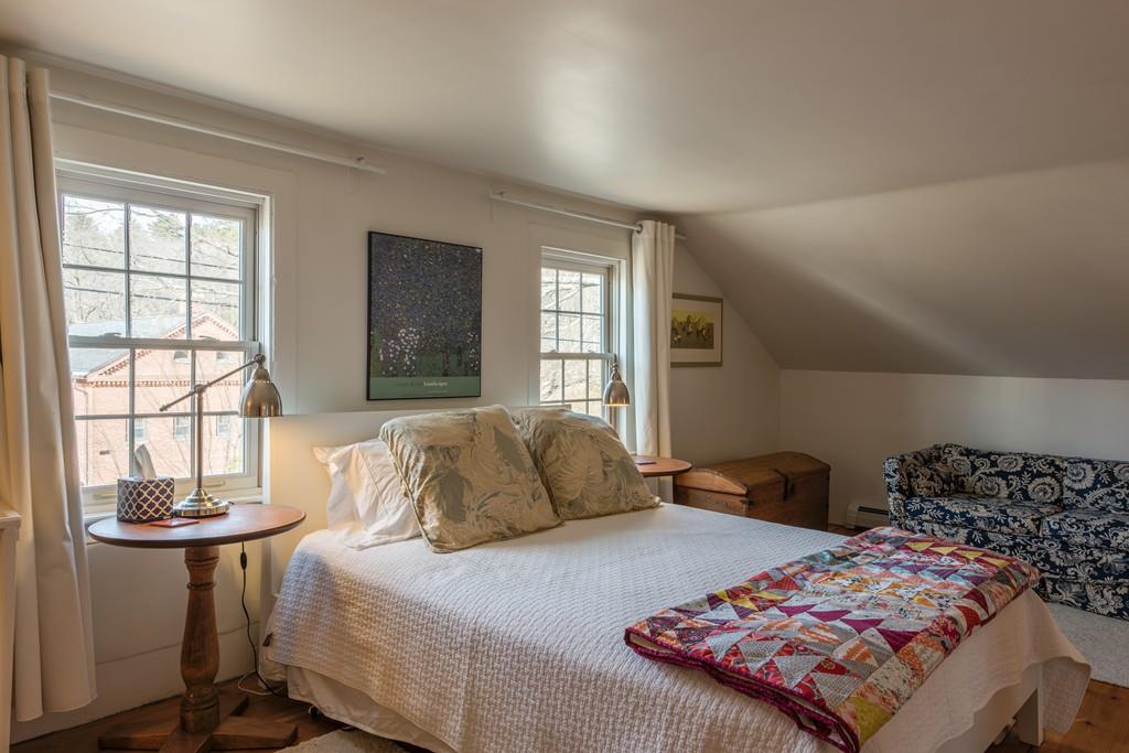 178 West Farms Road Northampton, MA 01062 - Photo 31 of 42 a bedroom with a bed and wooden floor