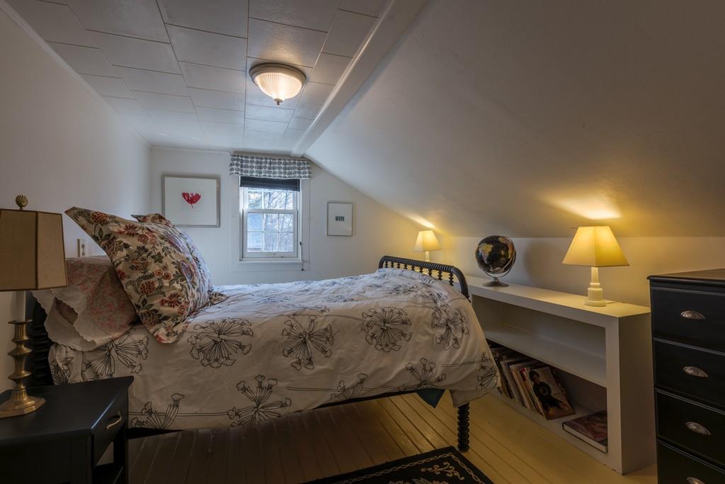 178 West Farms Road Northampton, MA 01062 - Photo 37 of 42 a bedroom with a bed and a view of kitchen