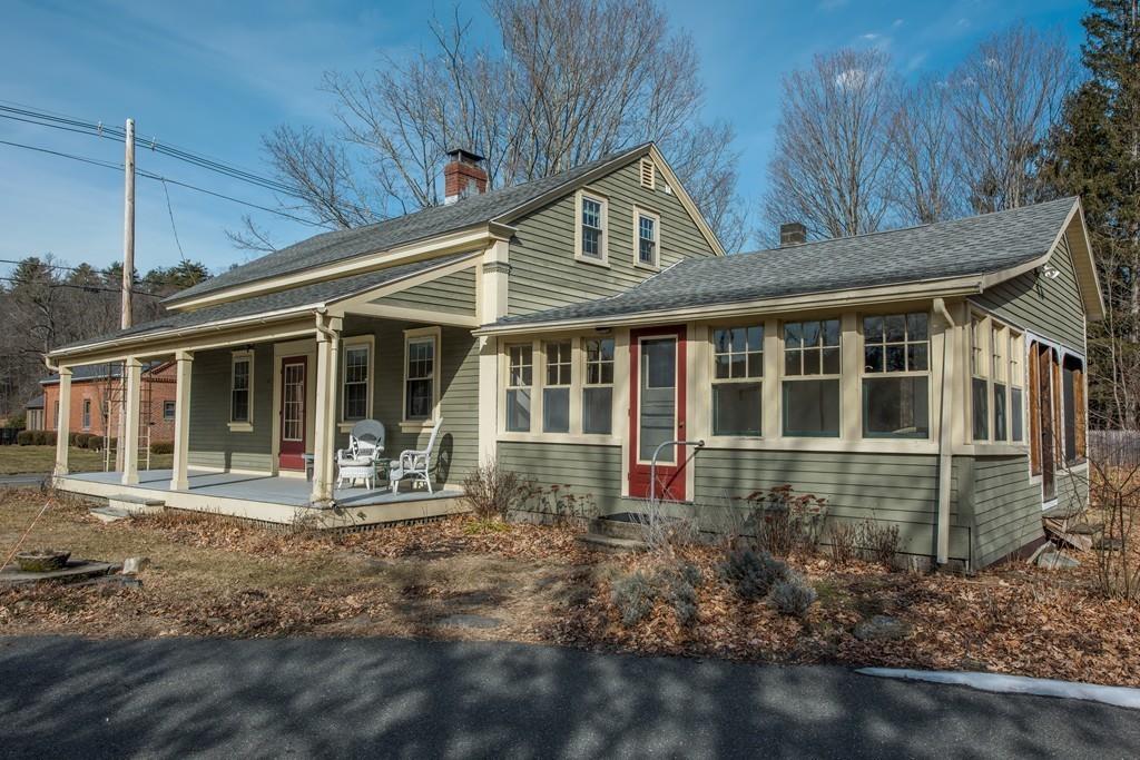 178 West Farms Road Northampton, MA 01062 - Photo 4 of 42 a front view of a house with a garden