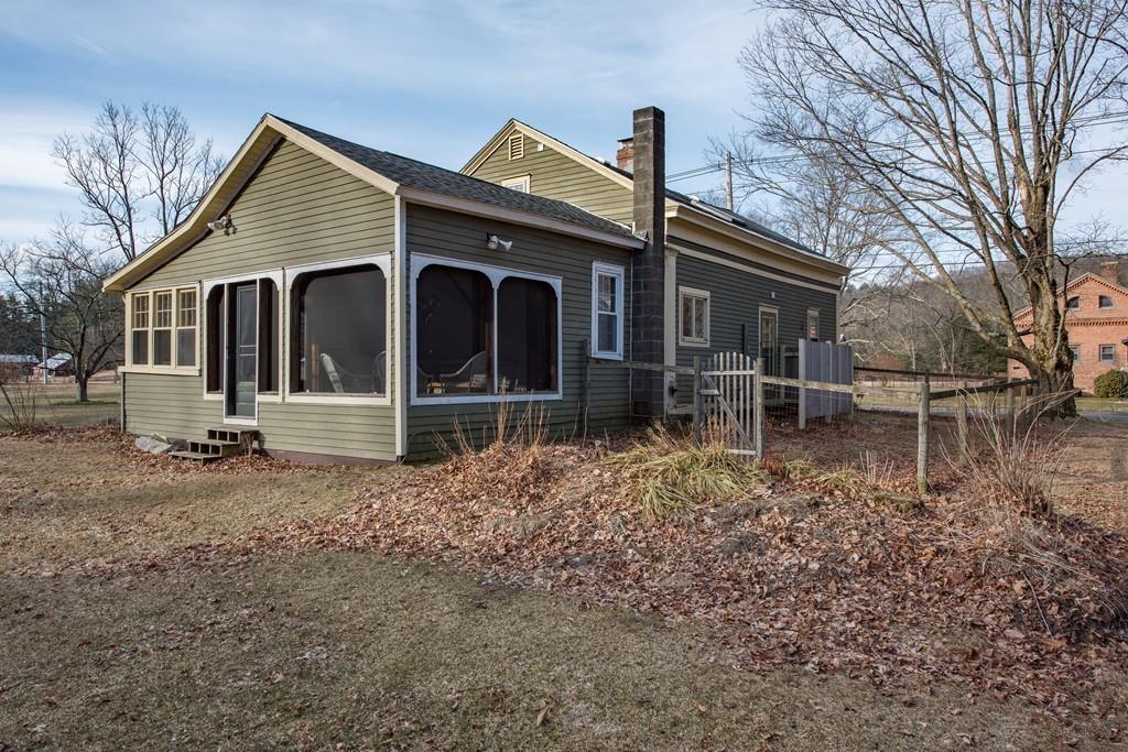178 West Farms Road Northampton, MA 01062 - Photo 7 of 42 a front view of a house with a garden