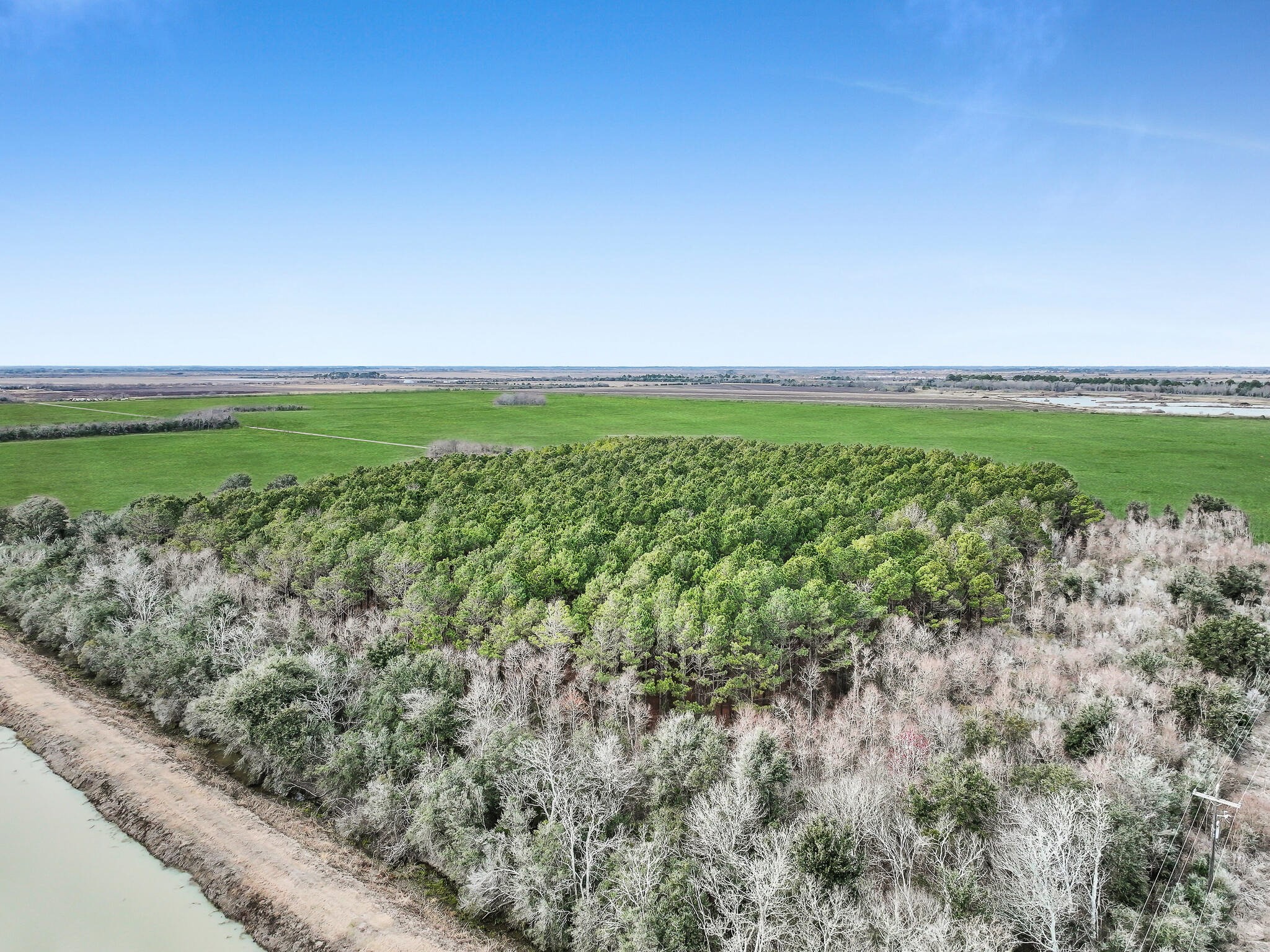 4 Canal Road Winnie, TX 77665 - Photo 15 of 21 a view of a field with an ocean