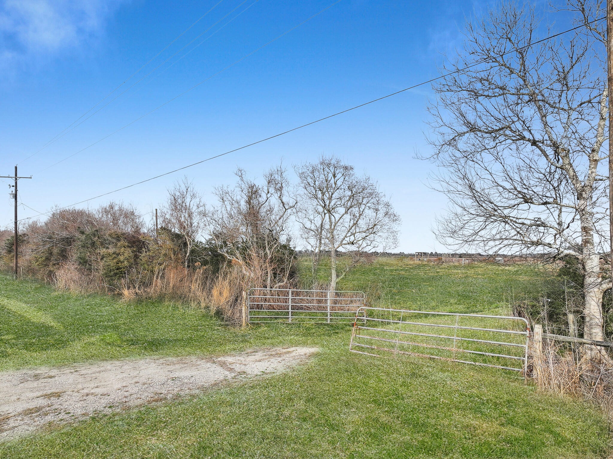 4 Canal Road Winnie, TX 77665 - Photo 7 of 21 a view of a yard with a tree