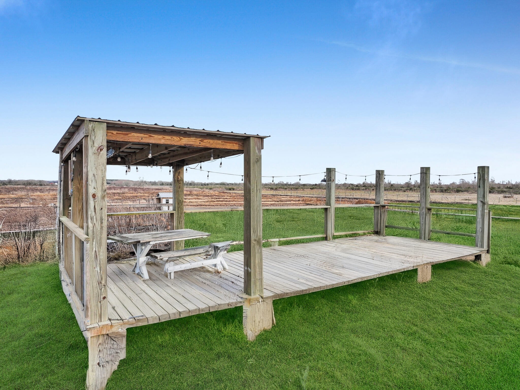 4 Canal Road Winnie, TX 77665 - Photo 8 of 21 a view of a patio with a yard